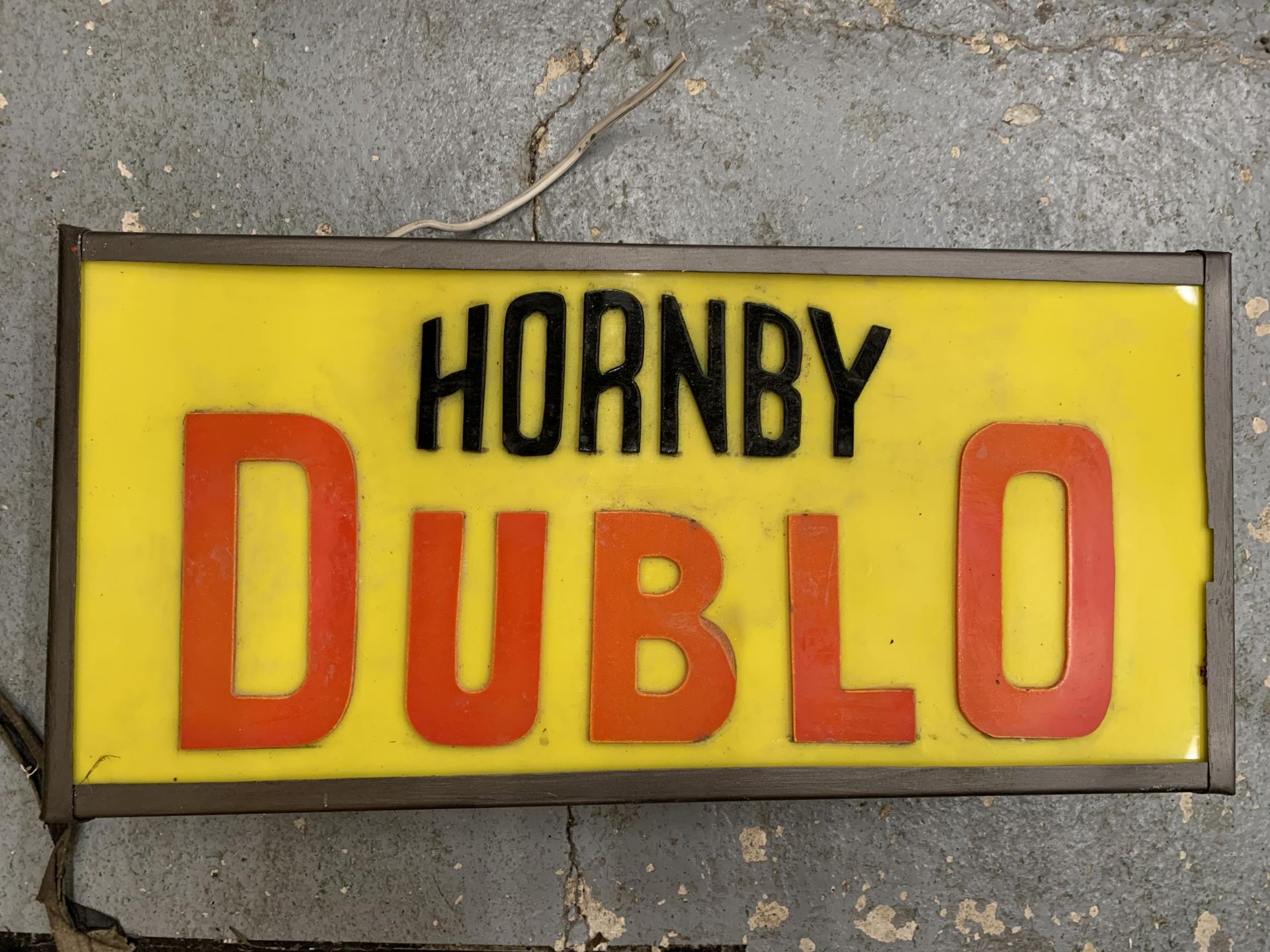 A HORNBY DUBLO ILLUMINATED LIGHT BOX SIGN 56CM X 27CM