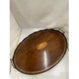 AN EDWARDIAN INLAID OVAL DRINKS TRAY, LENGTH 69CM