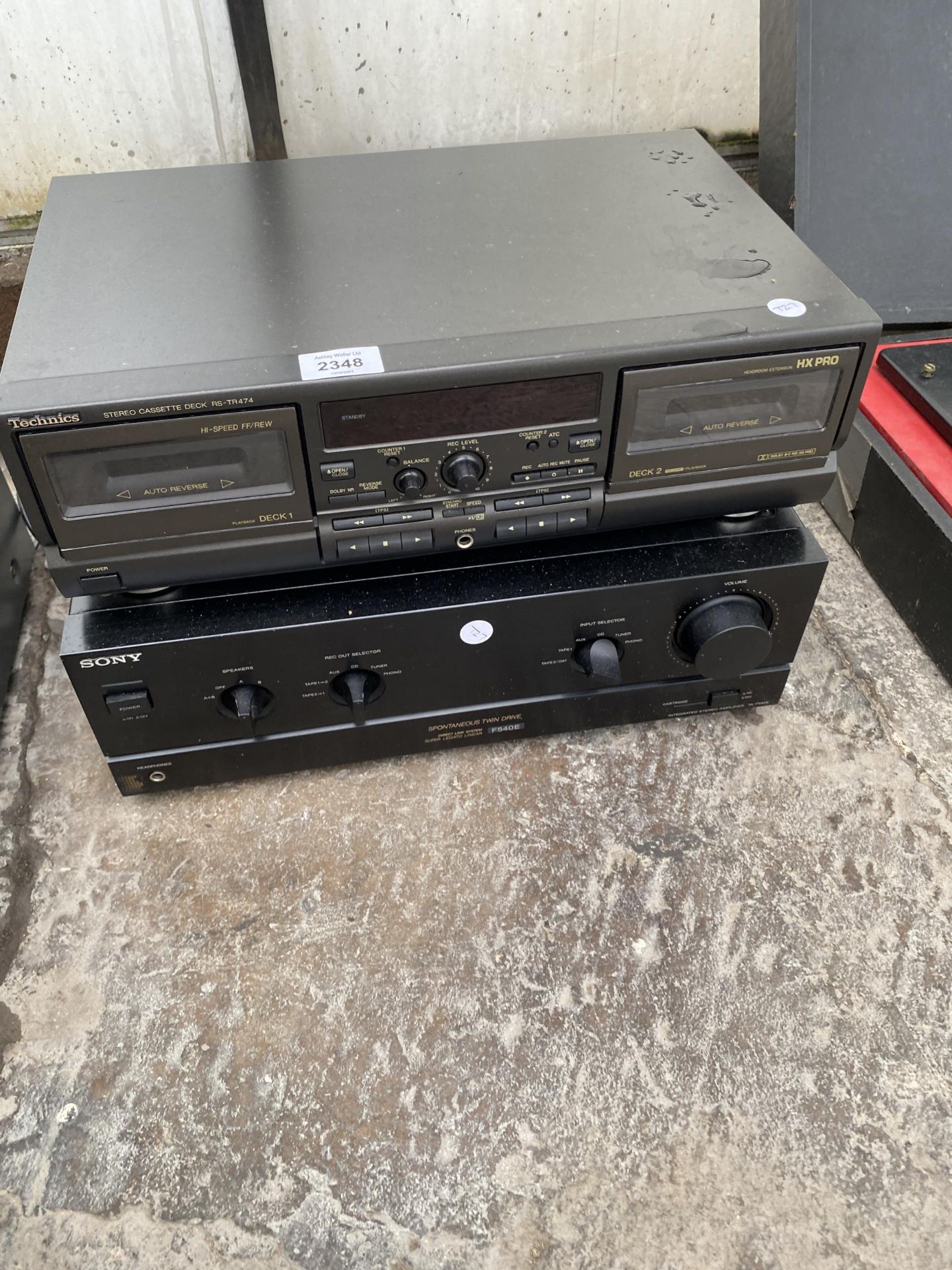 A TECHNICS STEREO CASETTE DECK AND A SONY AMPLIFIER