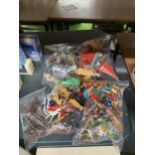 A GROUP OF ARMY FIGURES IN PLASTIC BAGS