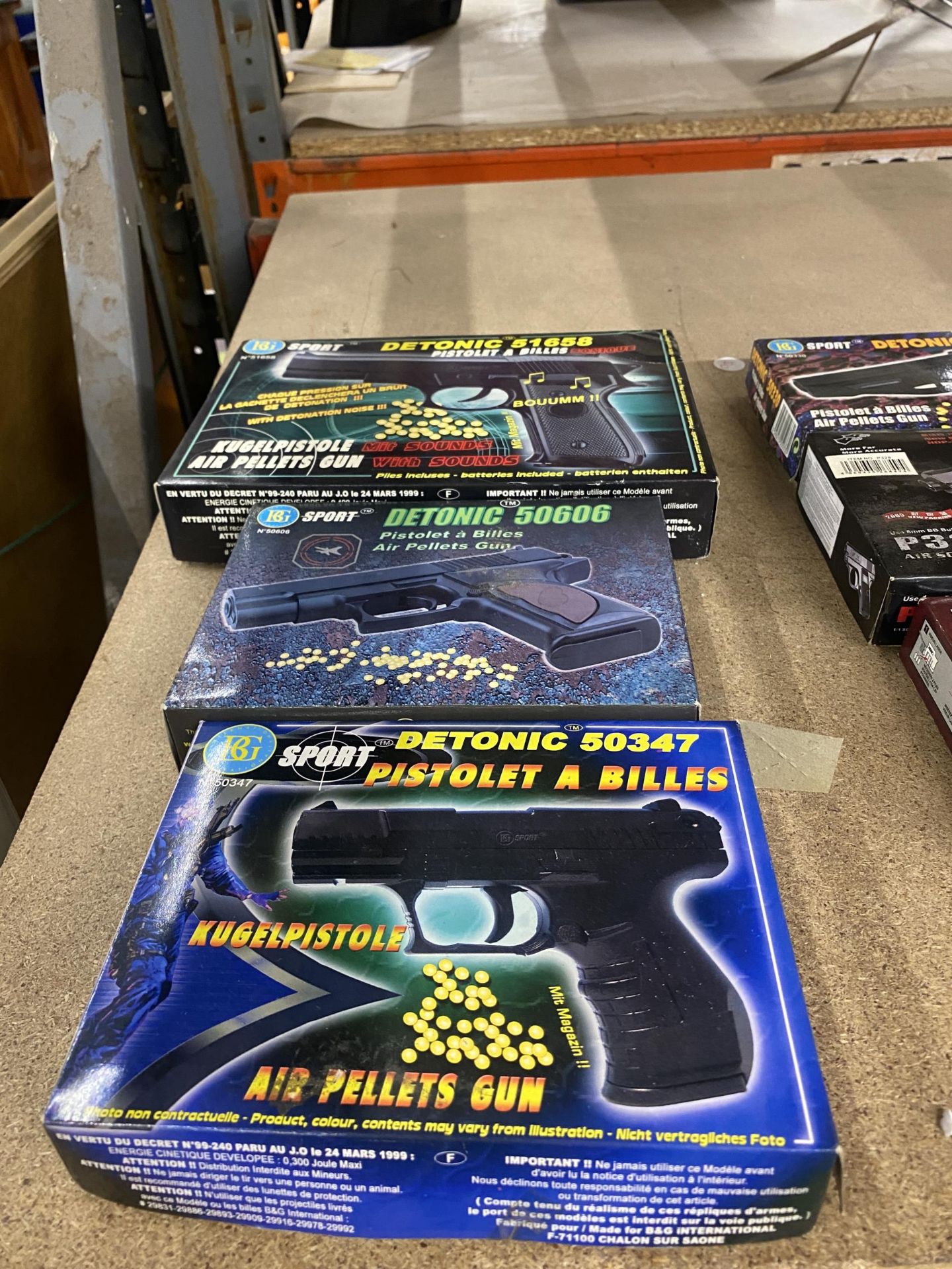 A GROUP OF BOXED AIR SPORT BB TOY GUNS