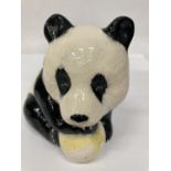 A BESWICK PANDA WITH A BALL