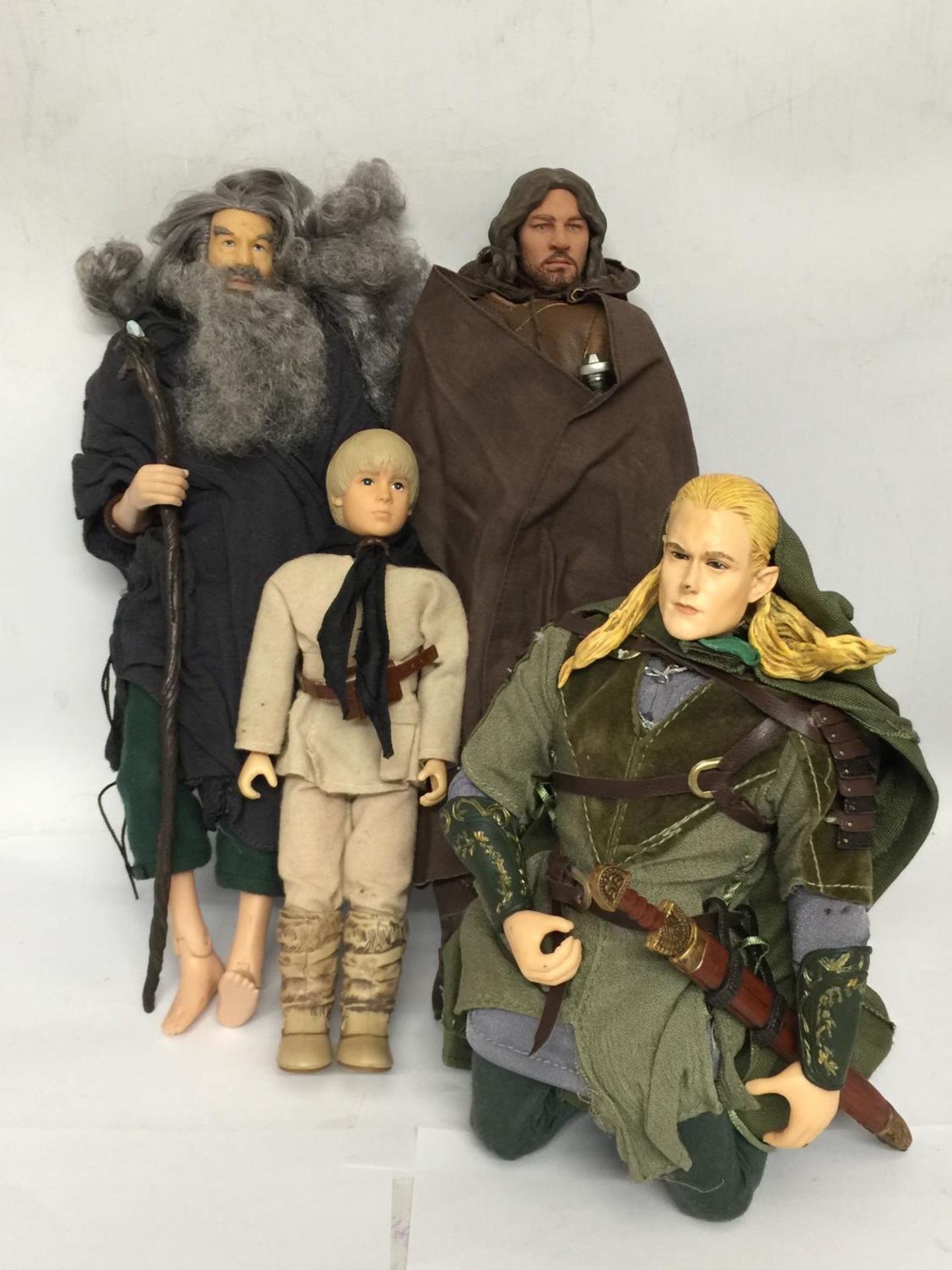 FOUR LARGE LORD OF THE RINGS FIGURES
