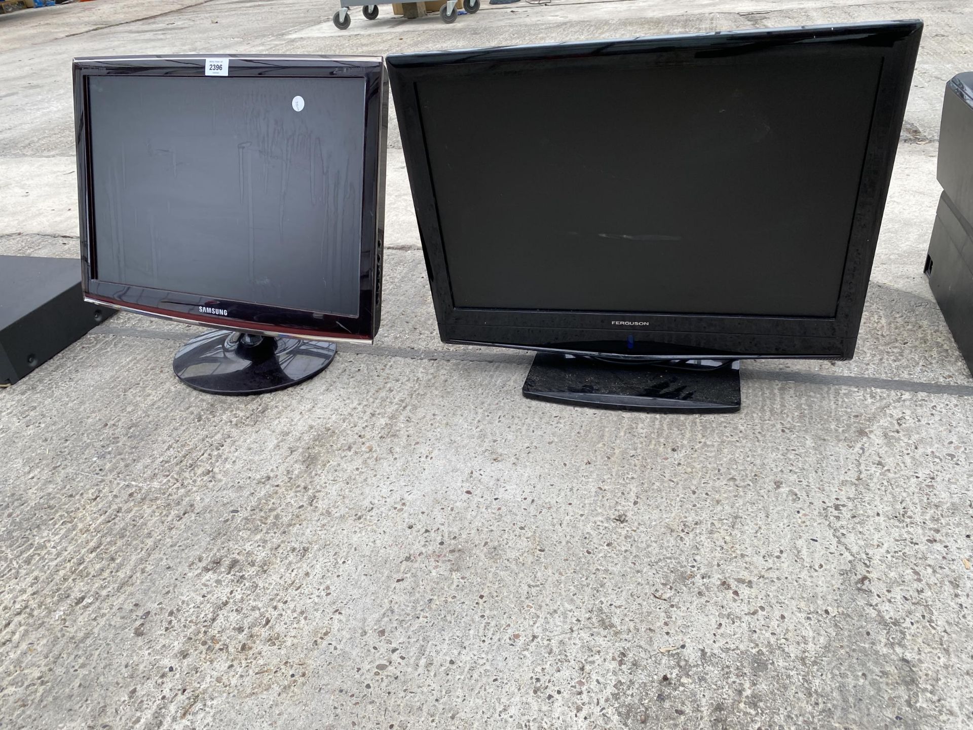 A SAMSUNG TELEVISION AND A FERGUSON TELEVISION