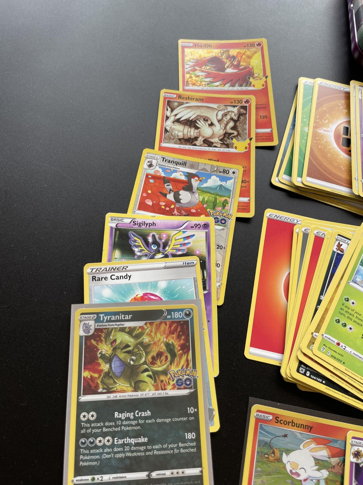 TWO TINS OF ASSORTED POKEMON CARDS, HOLOS, SMALL FOLDER OF CARDS ERC - Image 2 of 8