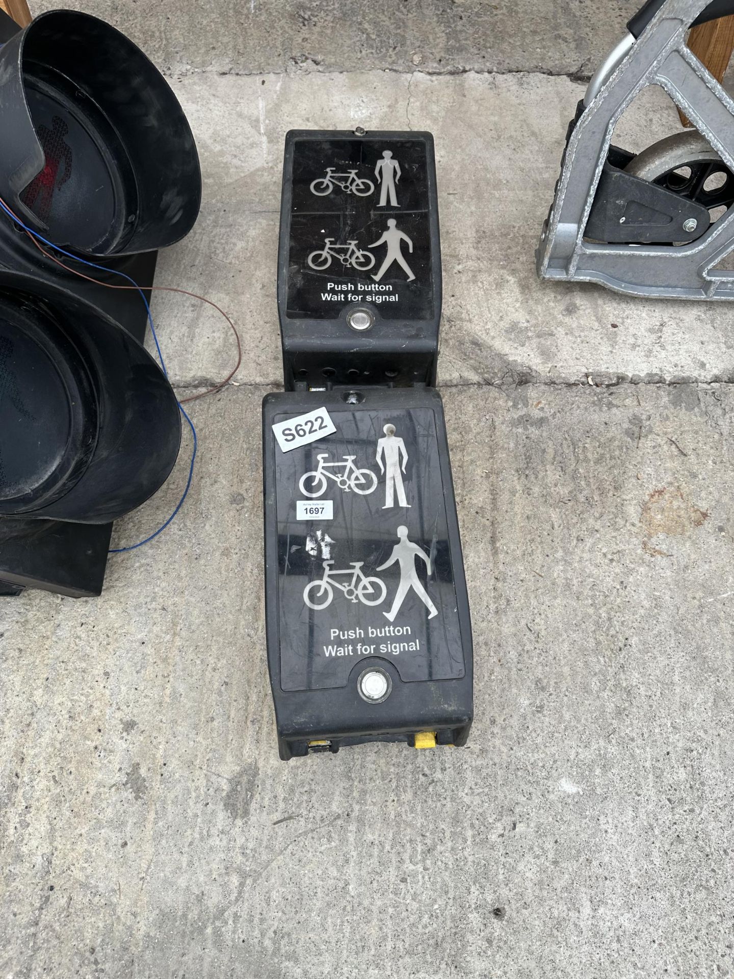 A PAIR OF PEDESTRIAN CROSSING SIGNAL BOXES