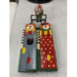 TWO WOODEN PENCIL BOXES IN THE SHAPE OF CLOWNS PLUS AN ACROBATIC CLOWN DESK TOY