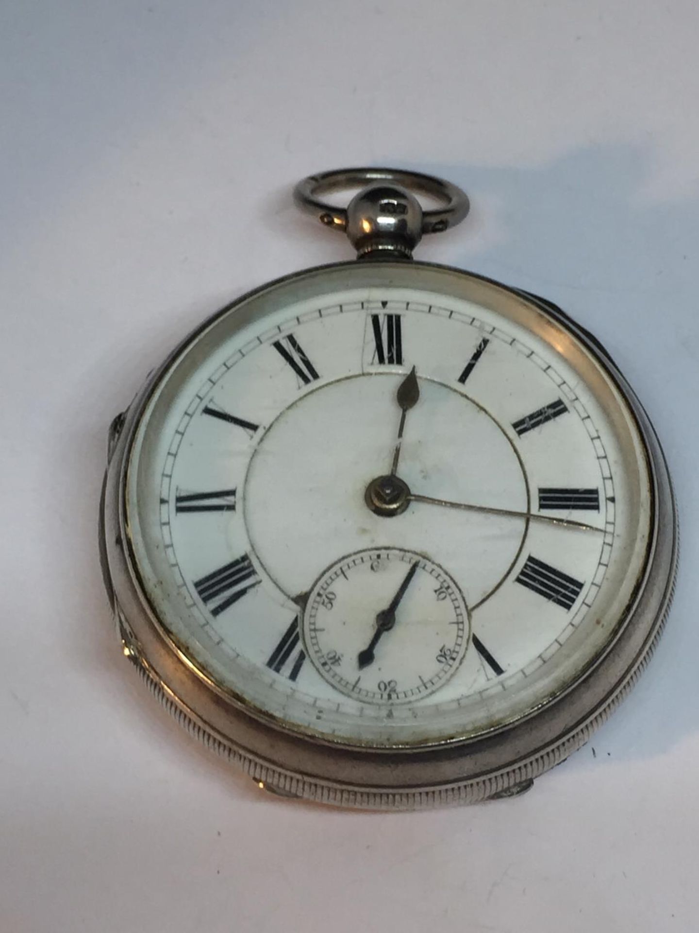 A HALLMARKED LONDON SILVER POCKET WATCH