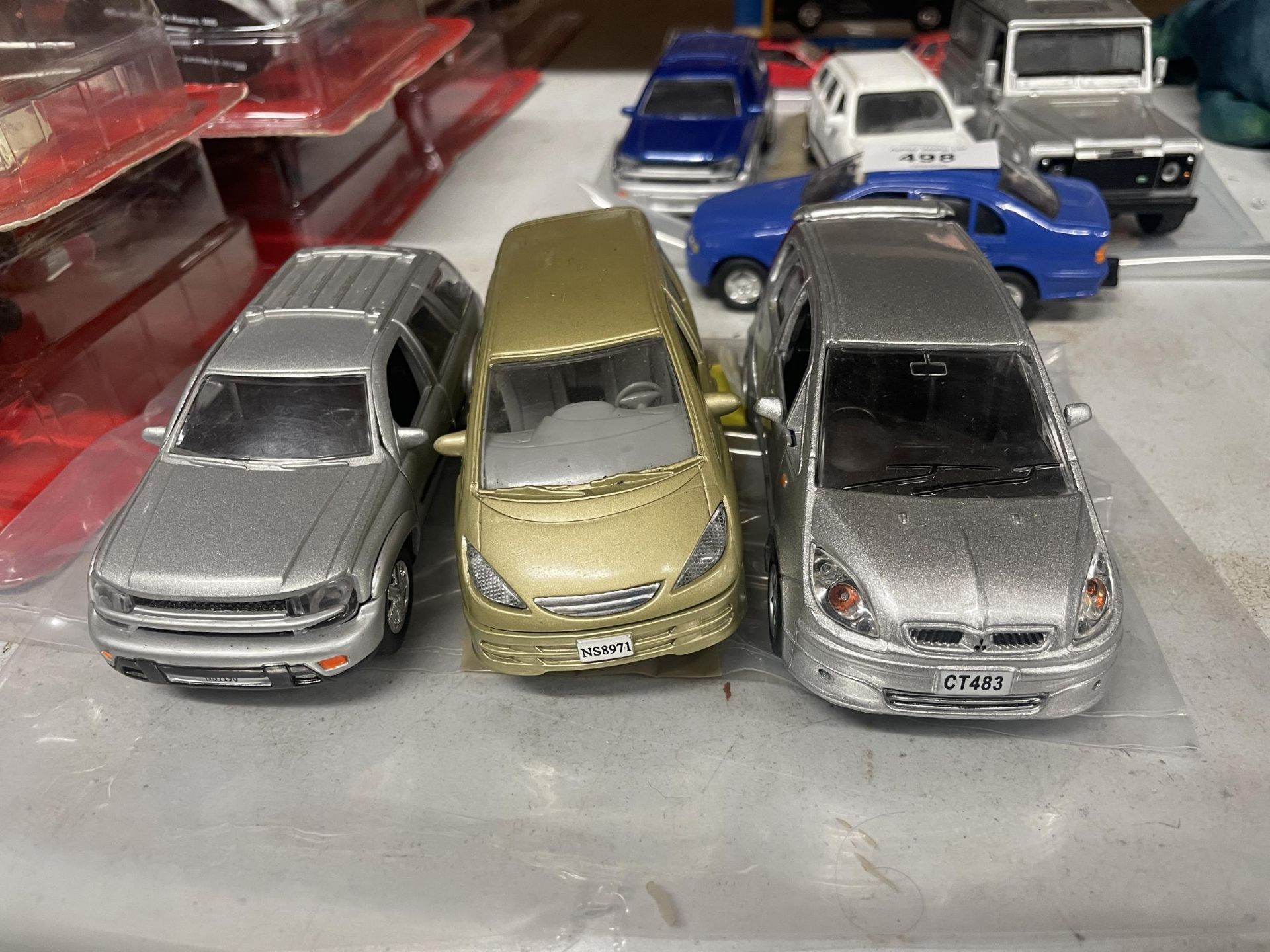 THREE DIE-CAST CARS TO INCLUDE A MITSUBISHI COLT