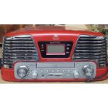 AN AS NEW RED GPO RECORRD/COMPACT DISC PLAYER