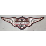 A CAST HARLEY DAVIDSON MOTOR CYCLE SIGN
