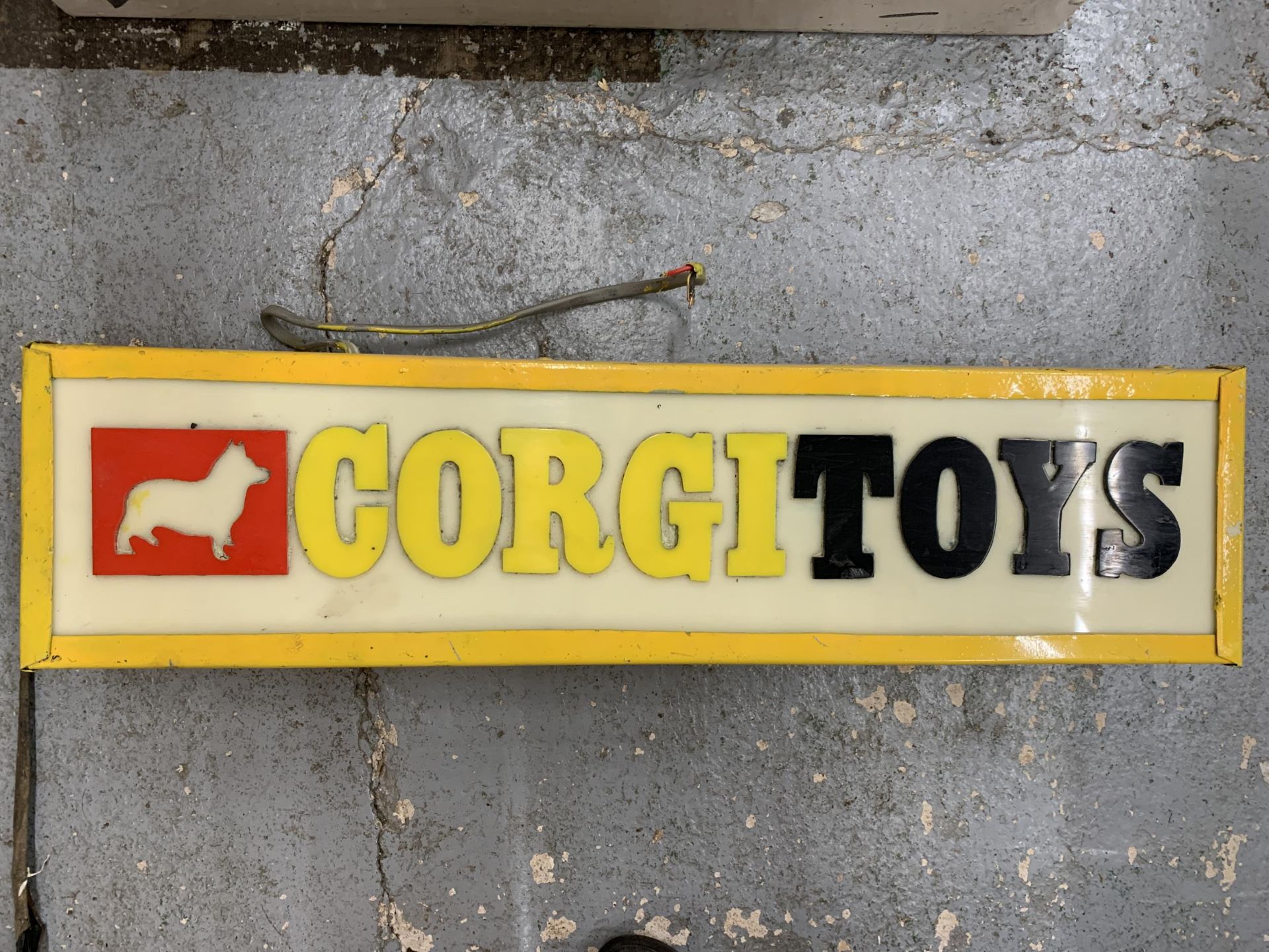 A CORGI TOYS ILLUMINATED LIGHT BOX SIGN 68CM X 17CM