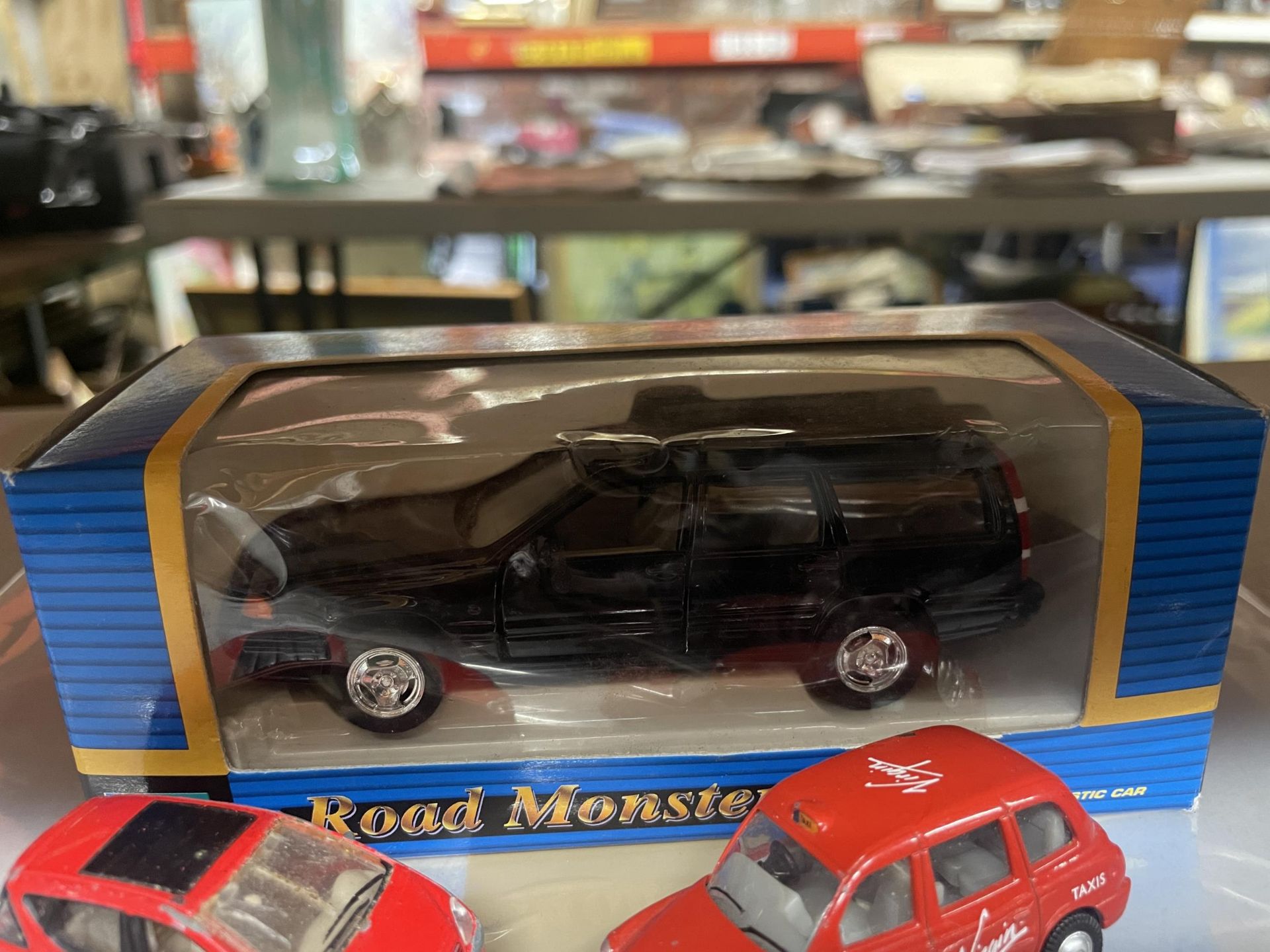 THREE DIE-CAST CARS TO INCLUDE A BOXED ROAD MONSTER - Image 2 of 2