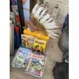 AN ASSORTMENT OF ITEMS TO INCLUDE COMICS, MAGAZINES AND A HEAD DRESS ETC