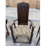 AN OAK EARLY 20TH CENTURY JACOBEAN STYLE THRONE CHAIR ON TURNED BULBOUS LEGS, WITH CARVED PANEL BACK