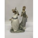 A LLADRO SUNNY DAY LADY FIGURINE NOW RETIRED TOGETHER WITH A NAO FIGURINE OF A GIRL WITH BIRDS (A/F)