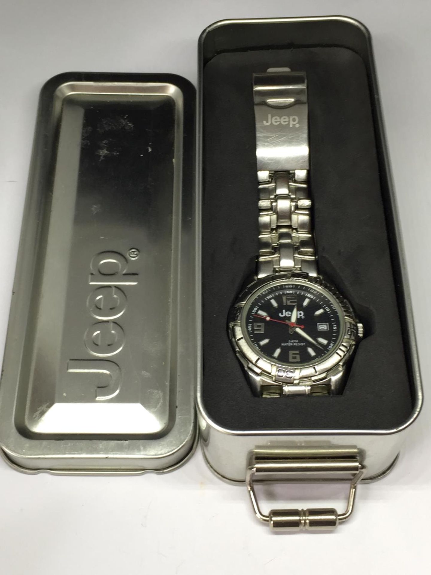 A JEEP WRIST WATCH AS NEW IN A PRESENTATION BOX SEEN WORKING BUT NO WARRANTY