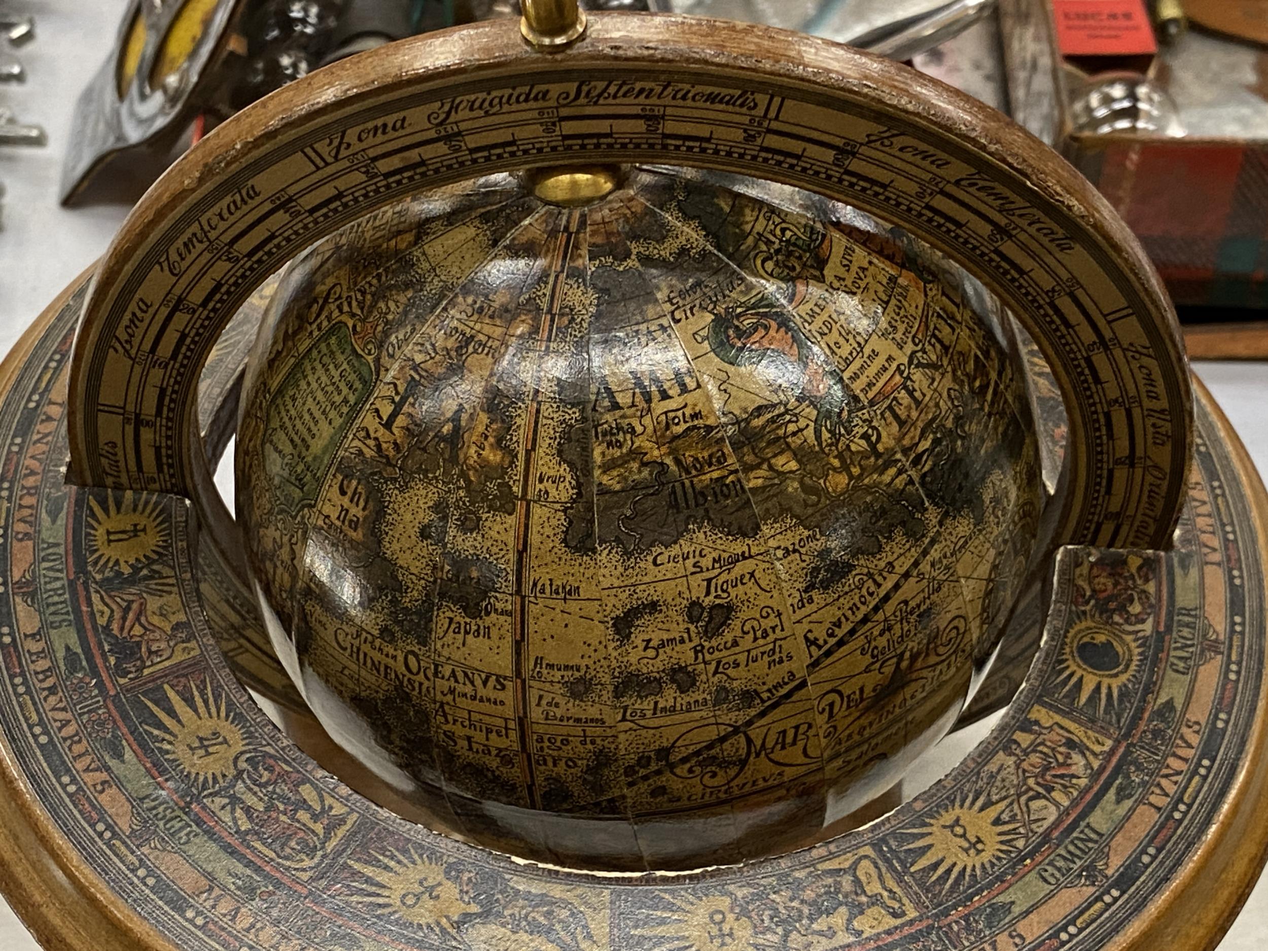 AN ITALIAN WOODEN ROTATING WORLD GLOBE WITH ASTROLOGICAL SIGNS TO THE SIDE, HEIGHT APPROX 23CM - Image 3 of 4