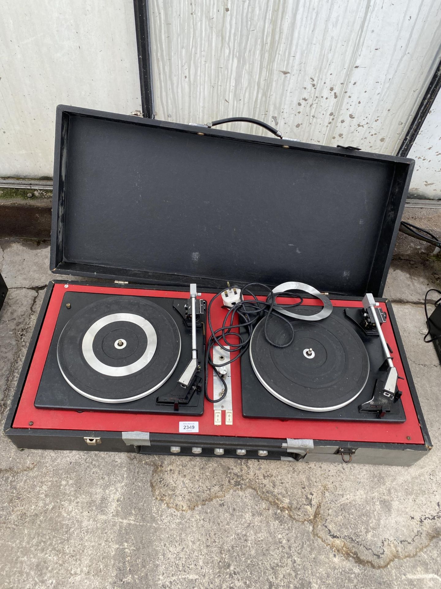 A RETRO CASED PORTABLE RECORD PLAYER