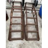 A PAIR OF METAL CAR RAMPS