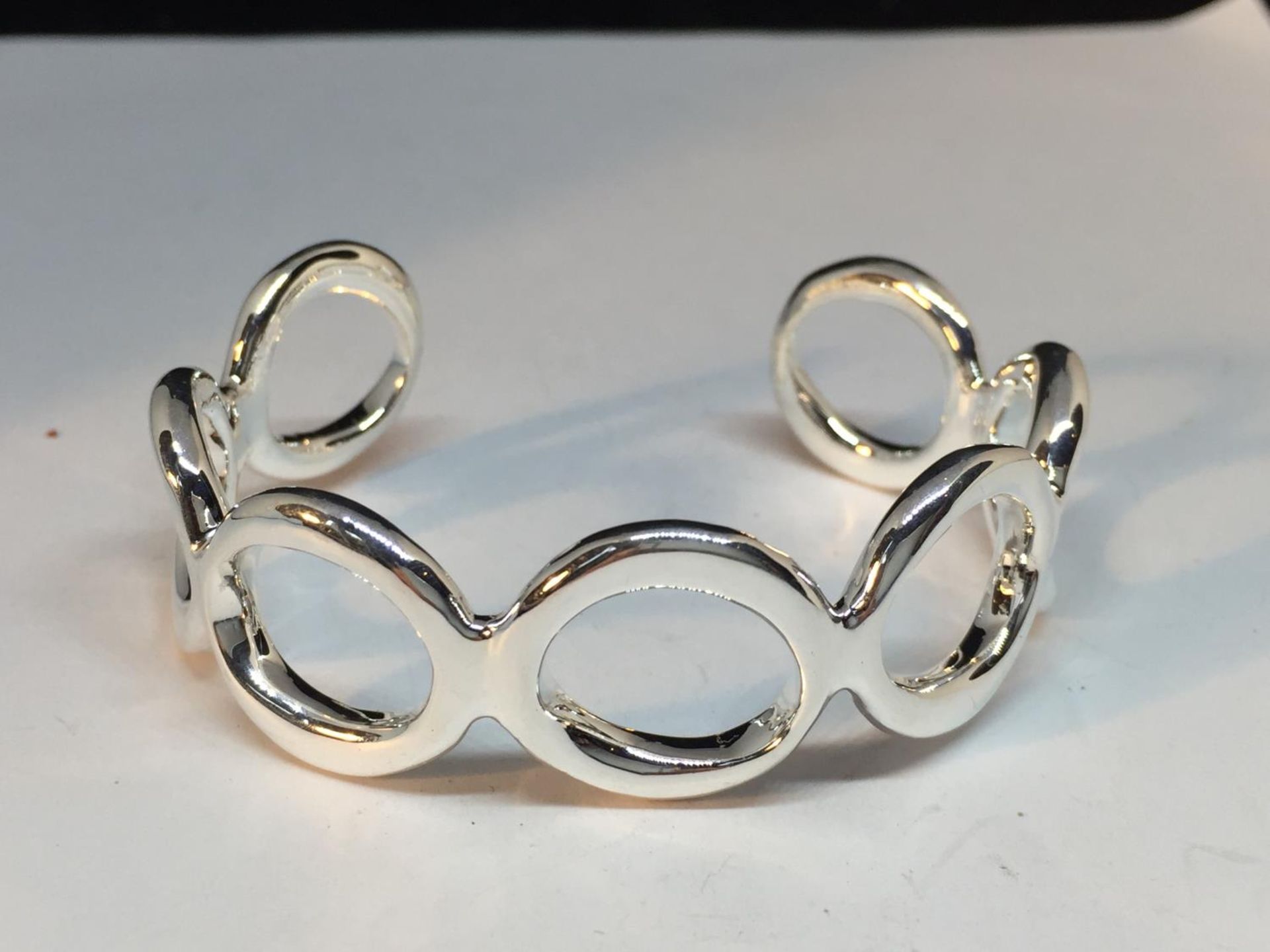 A SILVER BANGLE