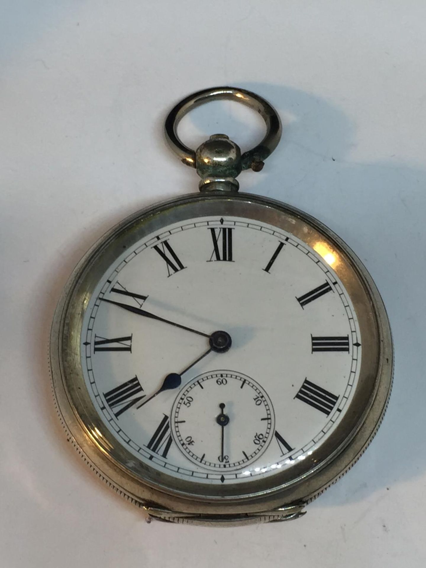 A MARKED 800 SILVER POCKET WATCH SEEN WORKING BUT NO WARRANTY