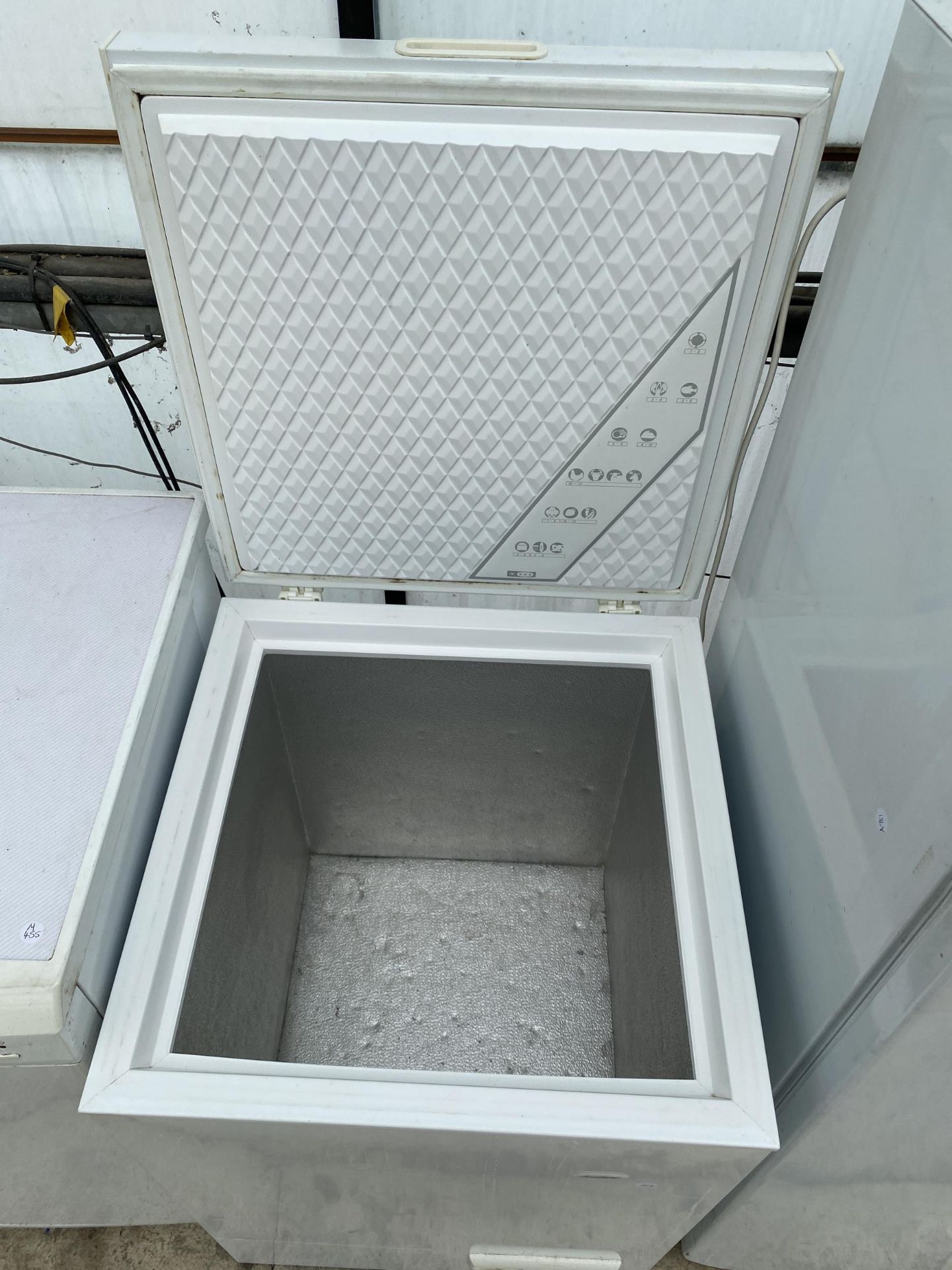 A SMALL WHITE CHEST FREEZER - Image 2 of 2