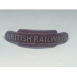 A VINTAGE BRITISH RAIL ENAMEL PORTERS CAP BADGE (J R GAUNT LONDON)