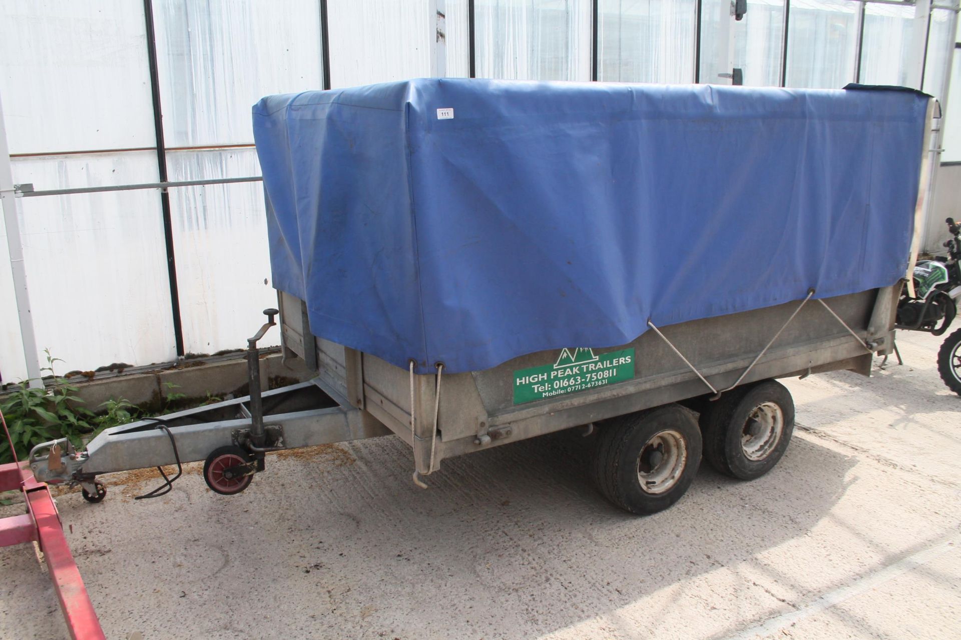 TWIN AXLE TRAILER WITH CAGE SIDES WITH A BLUE SHEET NO VAT