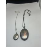 TWO SILVER LOCKETS ON CHAINS