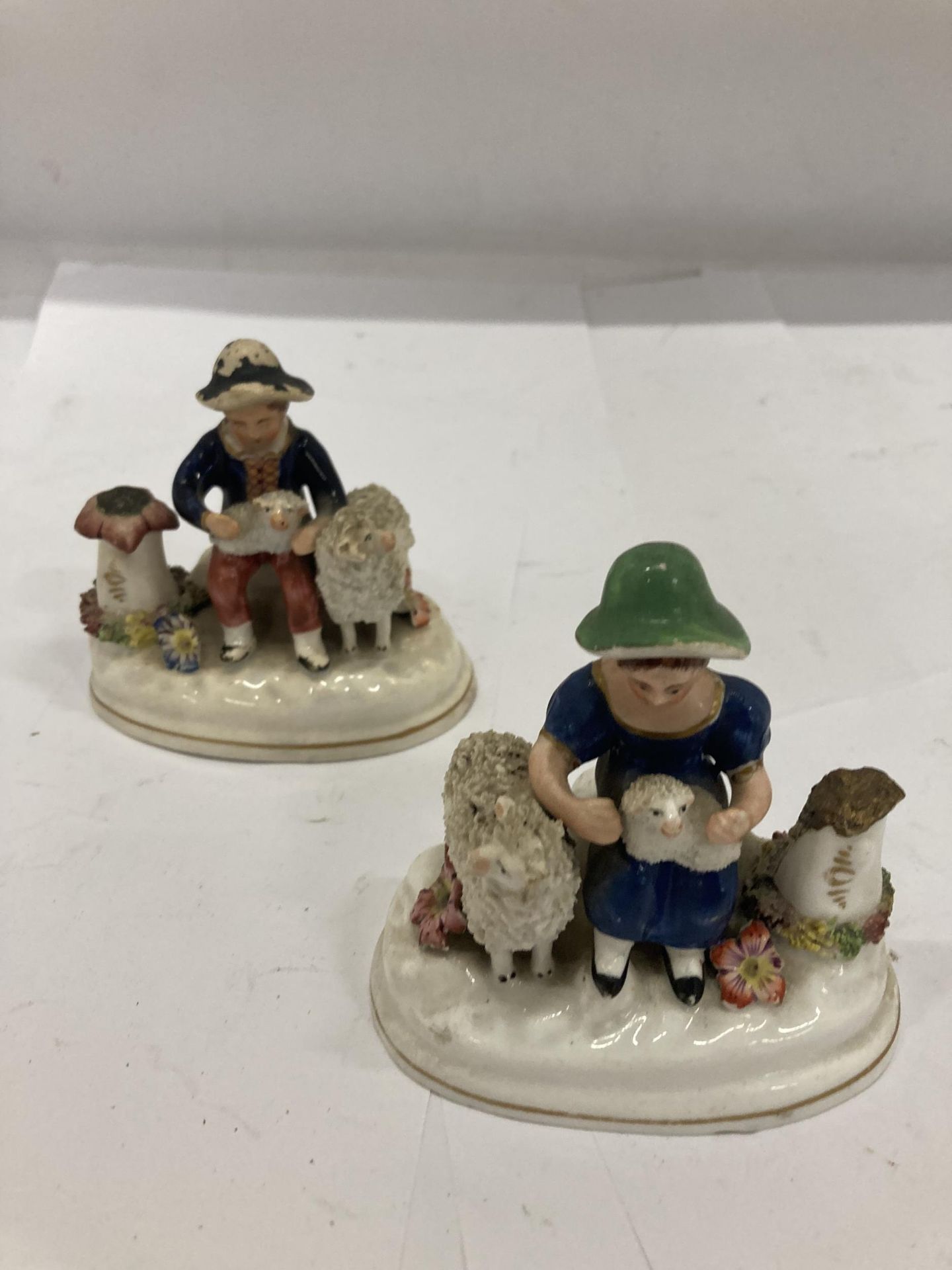 A PAIR OF VINTAGE STAFFORDSHIRE FIGURE WITH SHEEP