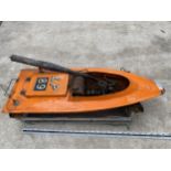 A VINTAGE FIBREGLASS BOAT WITH PETROL ENGINE AND MOTOR BEARING THE STAMP 'LP 89'