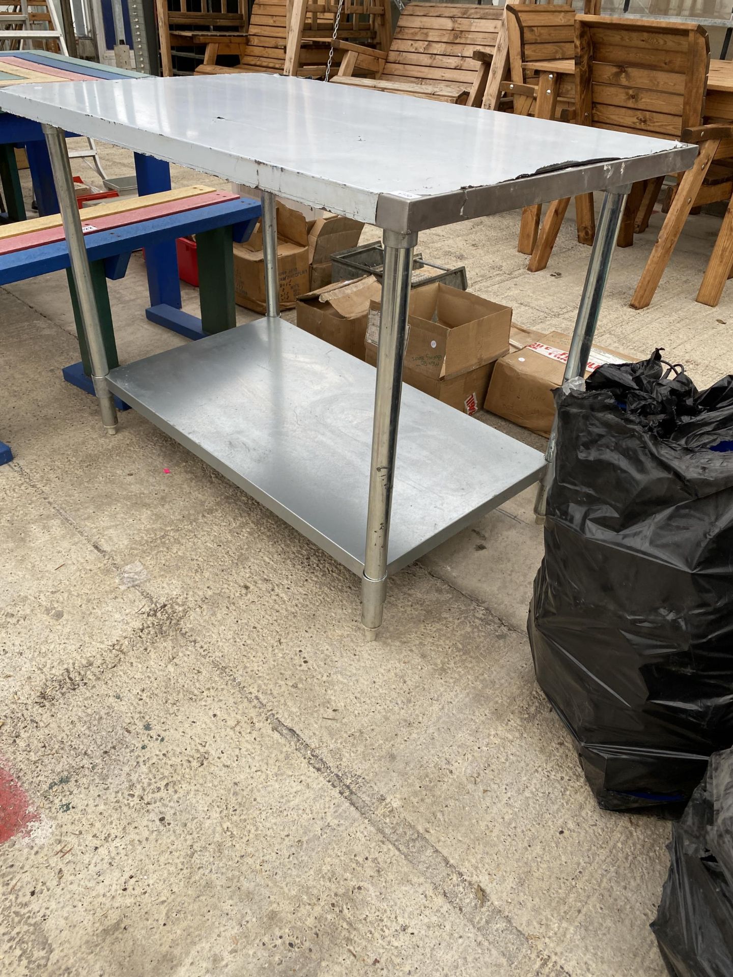 A TWO TIER STAINLESS STEEL KITCHEN WORK UNIT - Bild 2 aus 2