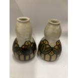 A PAIR OF EARLY ROYAL DOULTON VASES