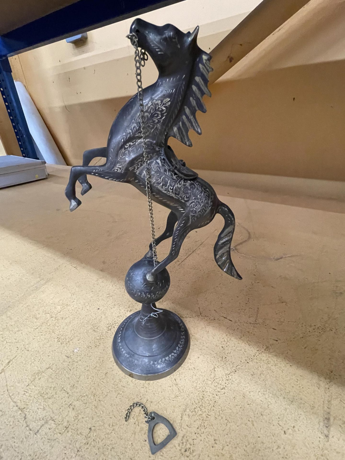 A BRASS HORSE ON PLINTH