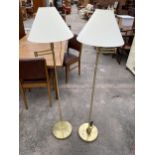 A PAIR OF BRASS FRANKLITE FLOOR LAMPS COMPLETE WITH SHADES