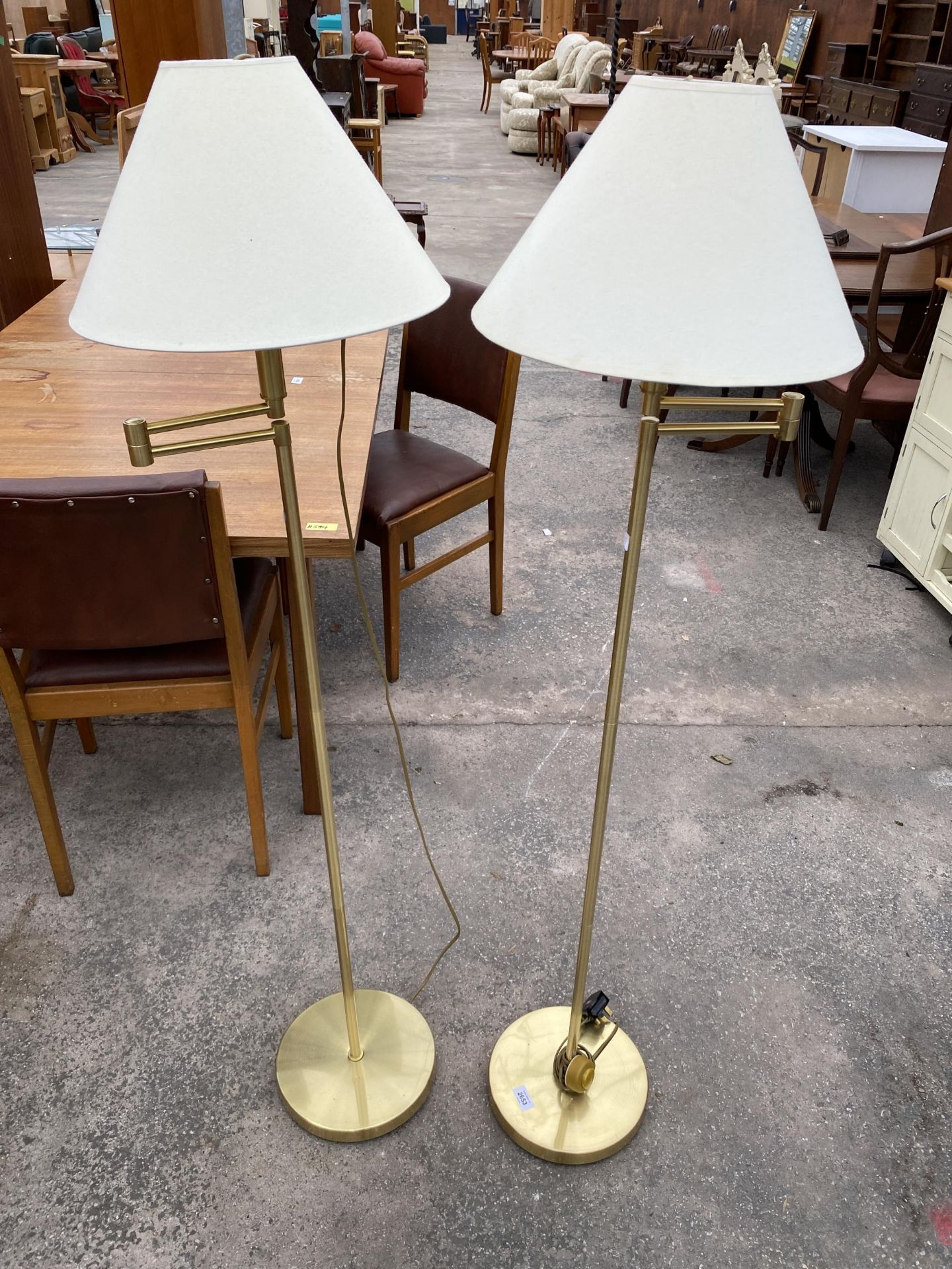 A PAIR OF BRASS FRANKLITE FLOOR LAMPS COMPLETE WITH SHADES