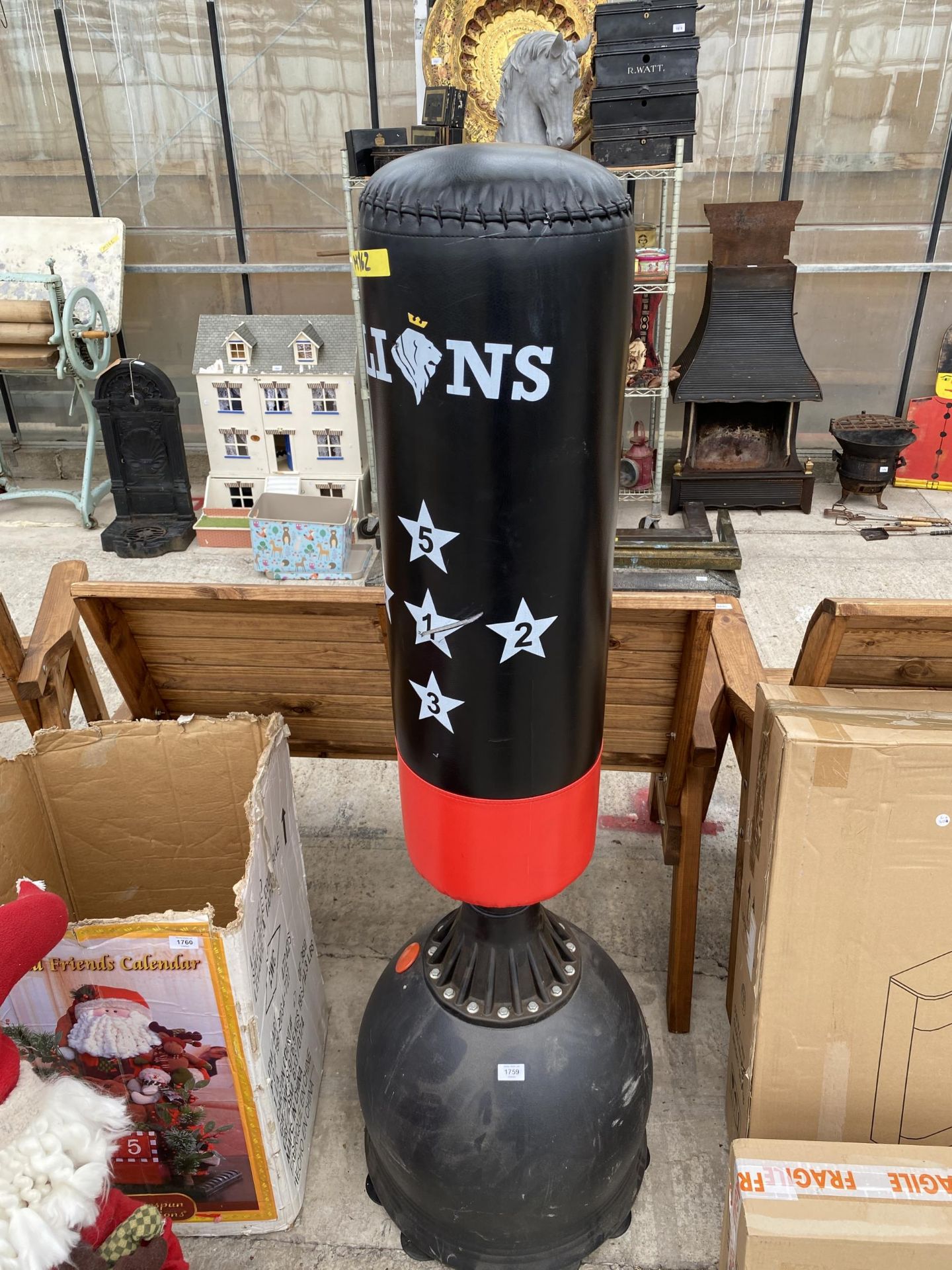 A LIONS FREESTANDING PUNCH BAG