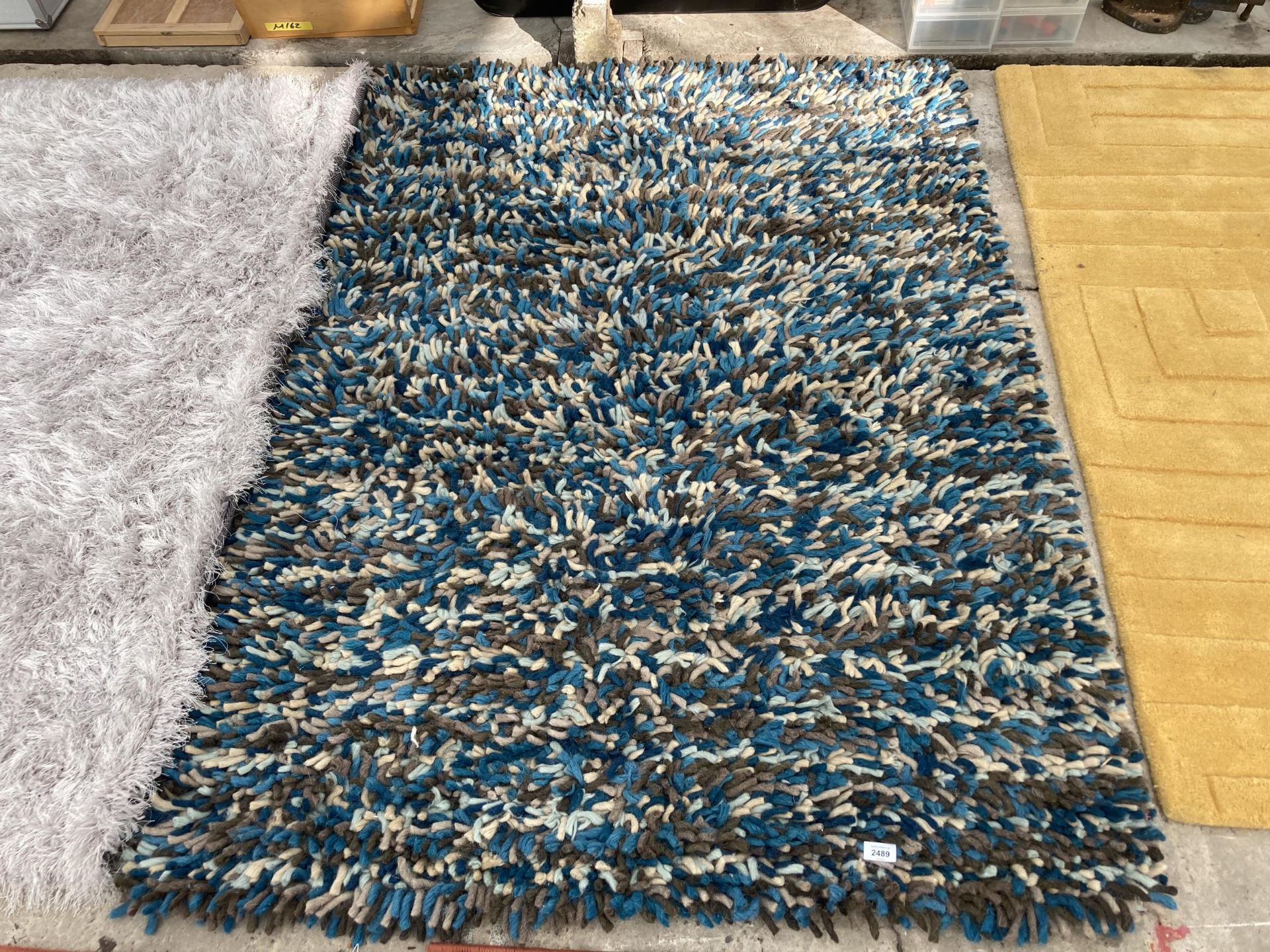 AN ORANGE PATTERNED CARPET RUNNER