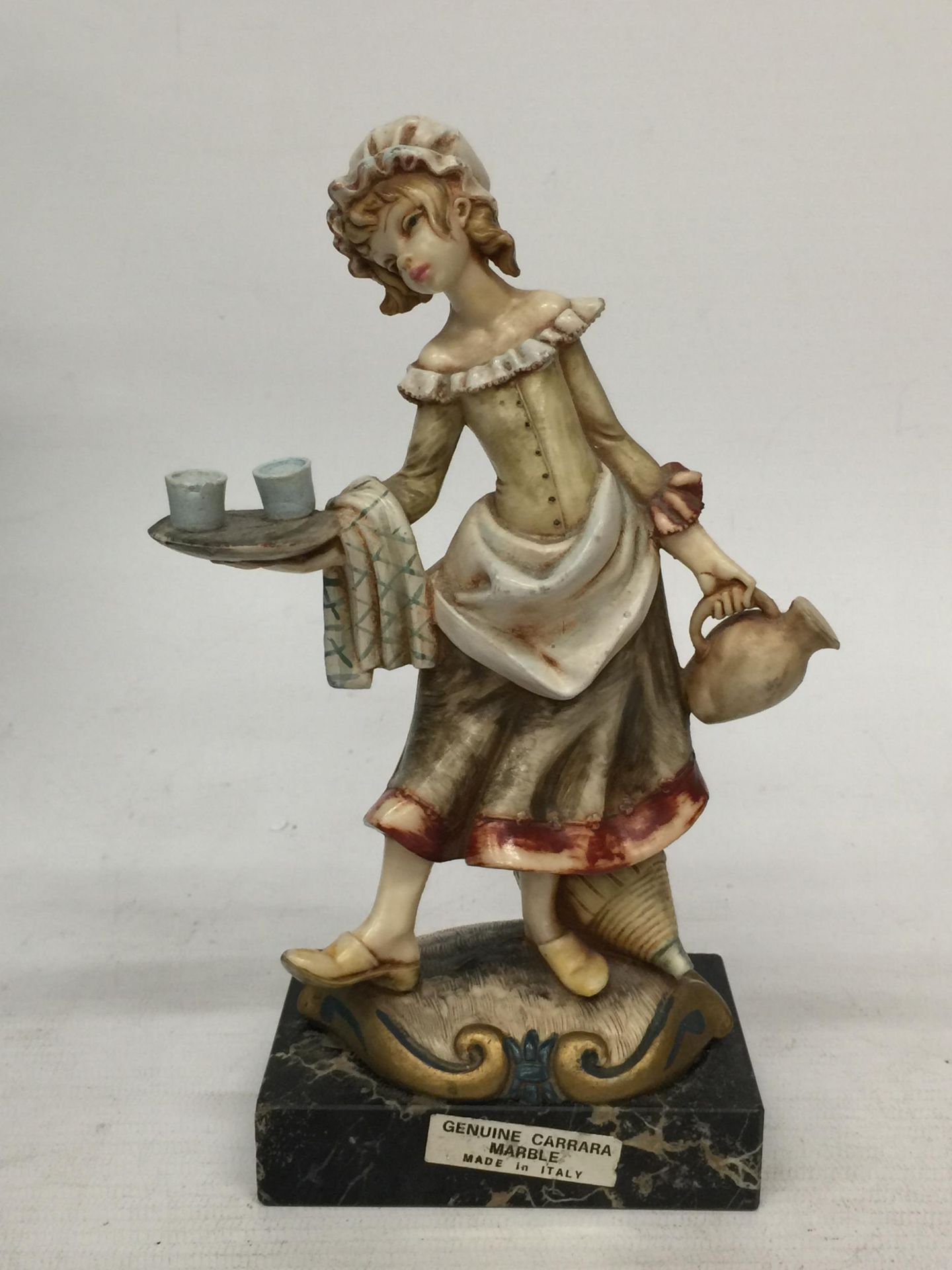 A VINTAGE SIMONELLI SERVING GIRL FIGURINE ITALY ON A GENUINE CARRARA MARBLE STAND