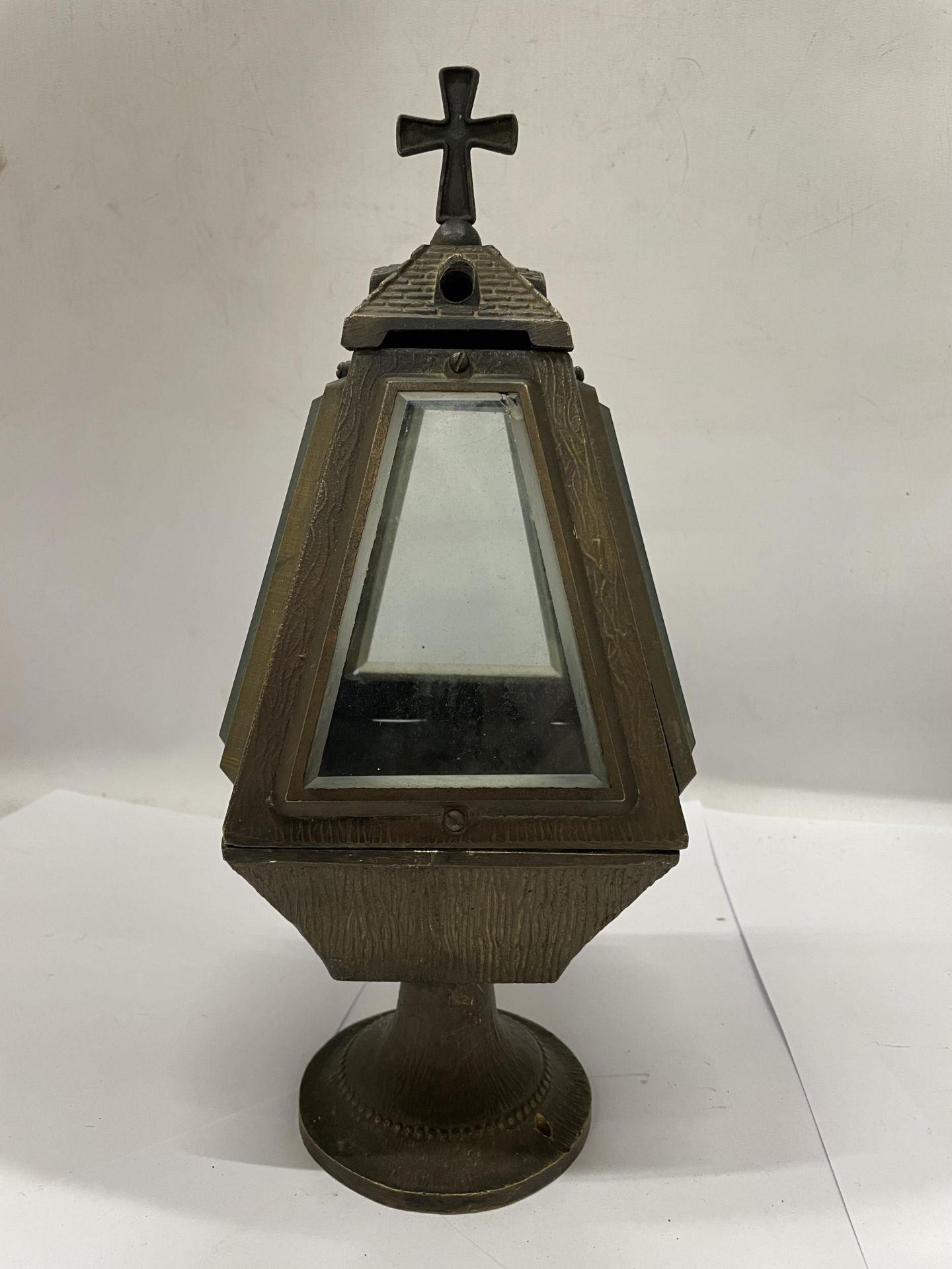 A BRASS CHURCH LANTERN WITH BEVELLED GLASS