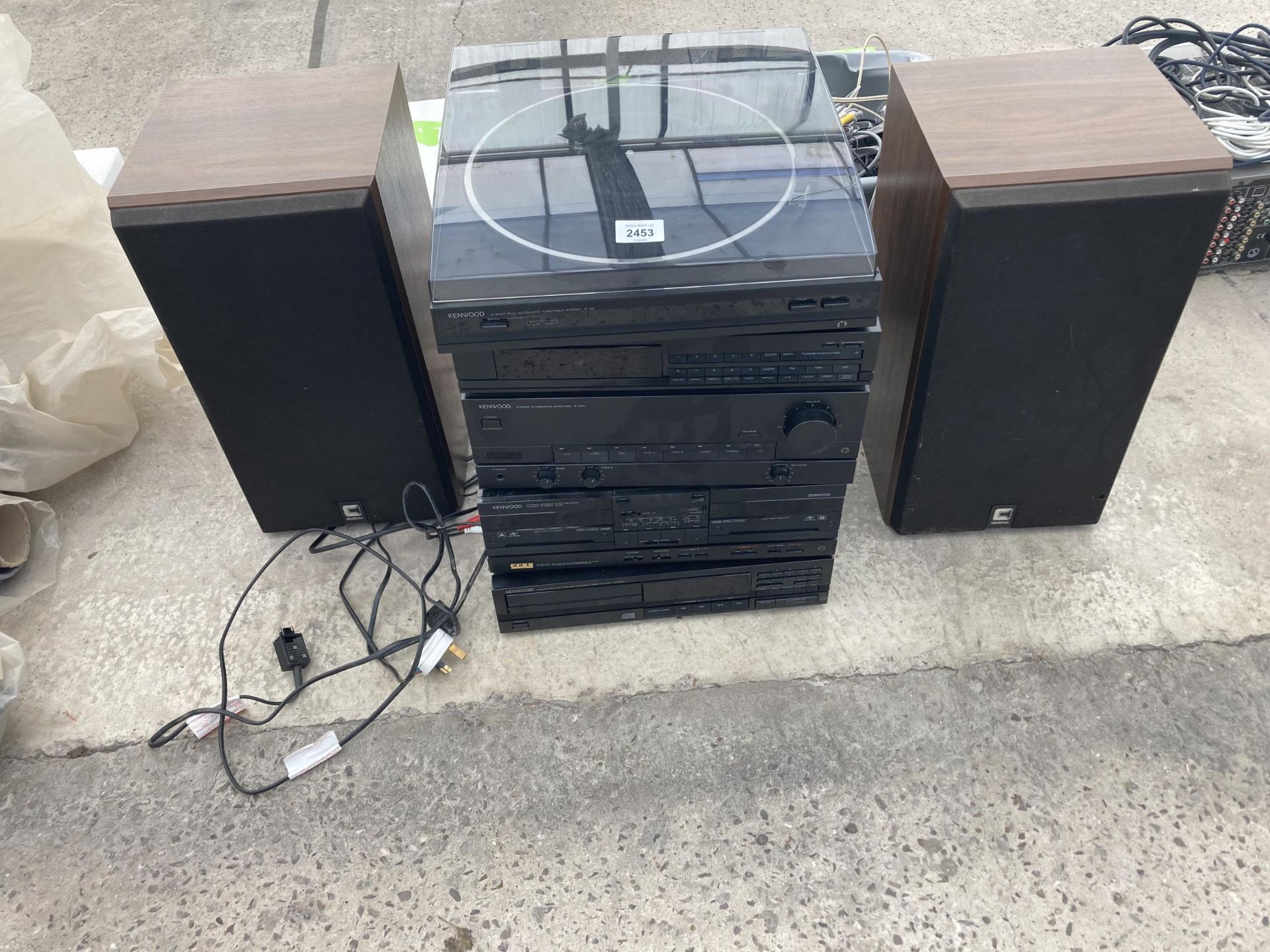 A KENWOOD STEREO SYSTEM WITH TWO WOODEN CASED CELESTION SPEAKERS