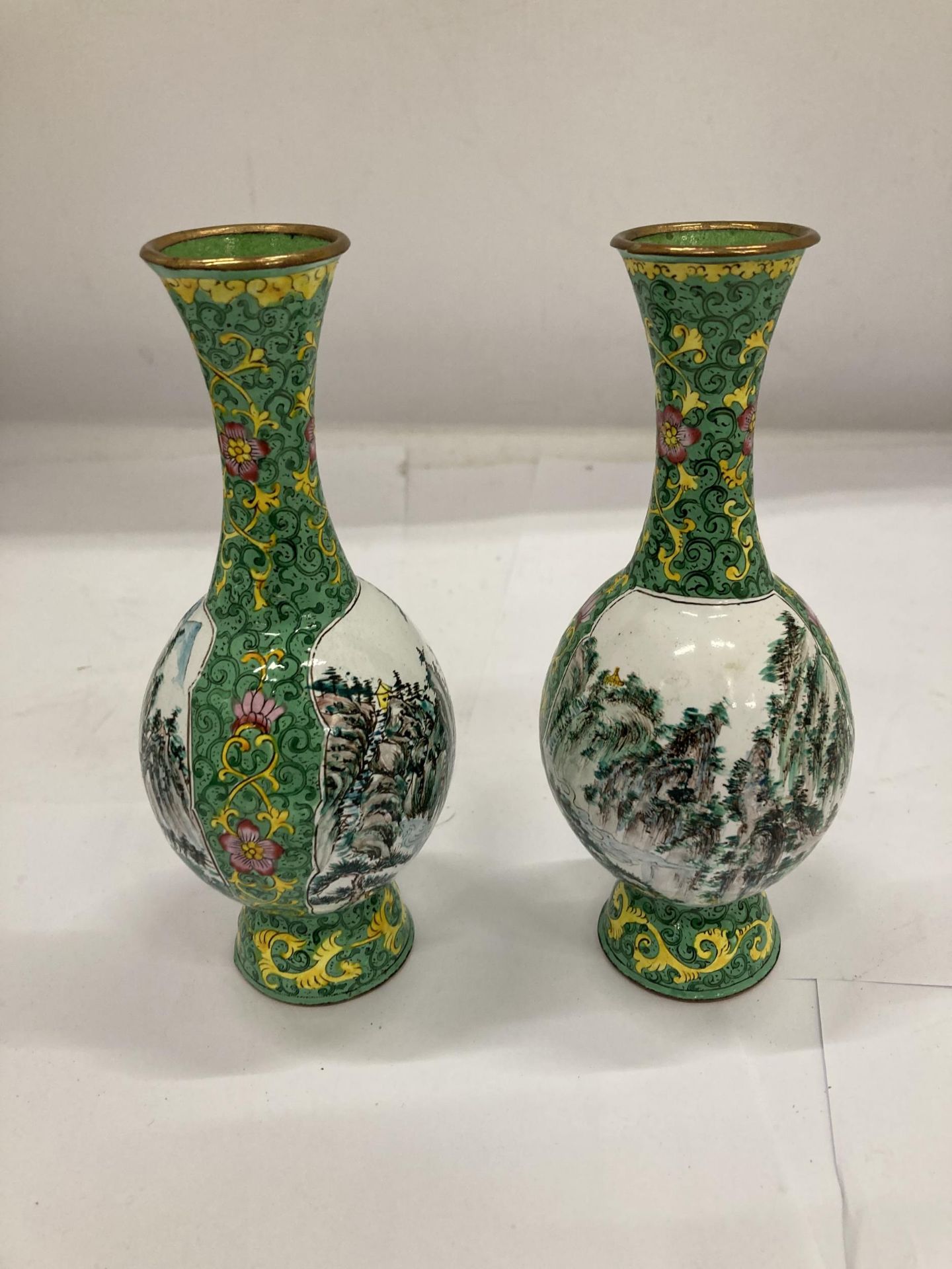 A PAIR OF ORIENTAL FAMILLE VERTE ENAMEL DESIGN VASES