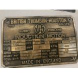 A VINTAGE CAST BRASS BRITISH THOMSON HOUSTON INDUCTION MOTOR DATA PLATE