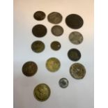 FOURTEEN VARIOUS FOREIGN COINS AND TOKENS