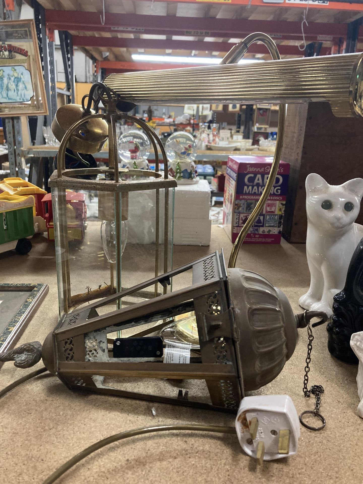 THREE ITEMS - MODERN LANTERNS AND A BRASS DESK LAMP