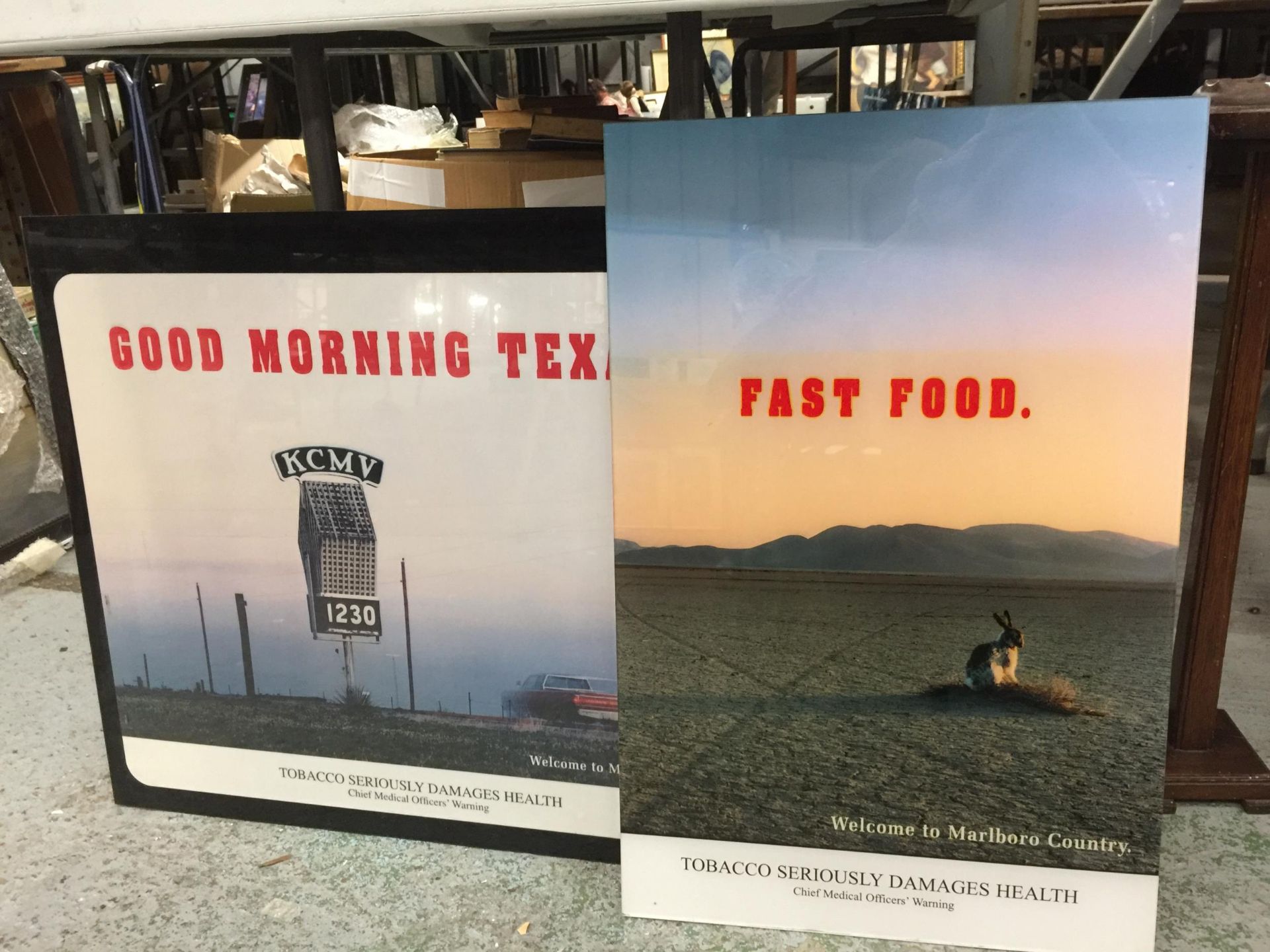 TWO MARLBORO CIGARETTE ADVERTISING POSTERS WITH PERSPEX COVERING