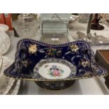 A COBALT BLUE AND GILT TWIN HANDLED BOWL WITH HAND PAINTED DESIGN, SIGNED L.MONET