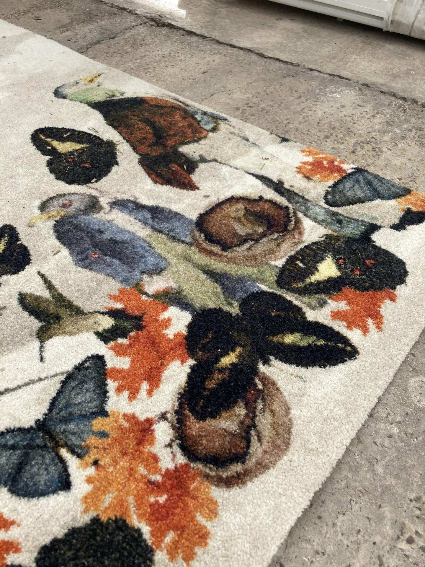 A MODERN RUG WITH ANIMAL DESIGN - Image 3 of 3