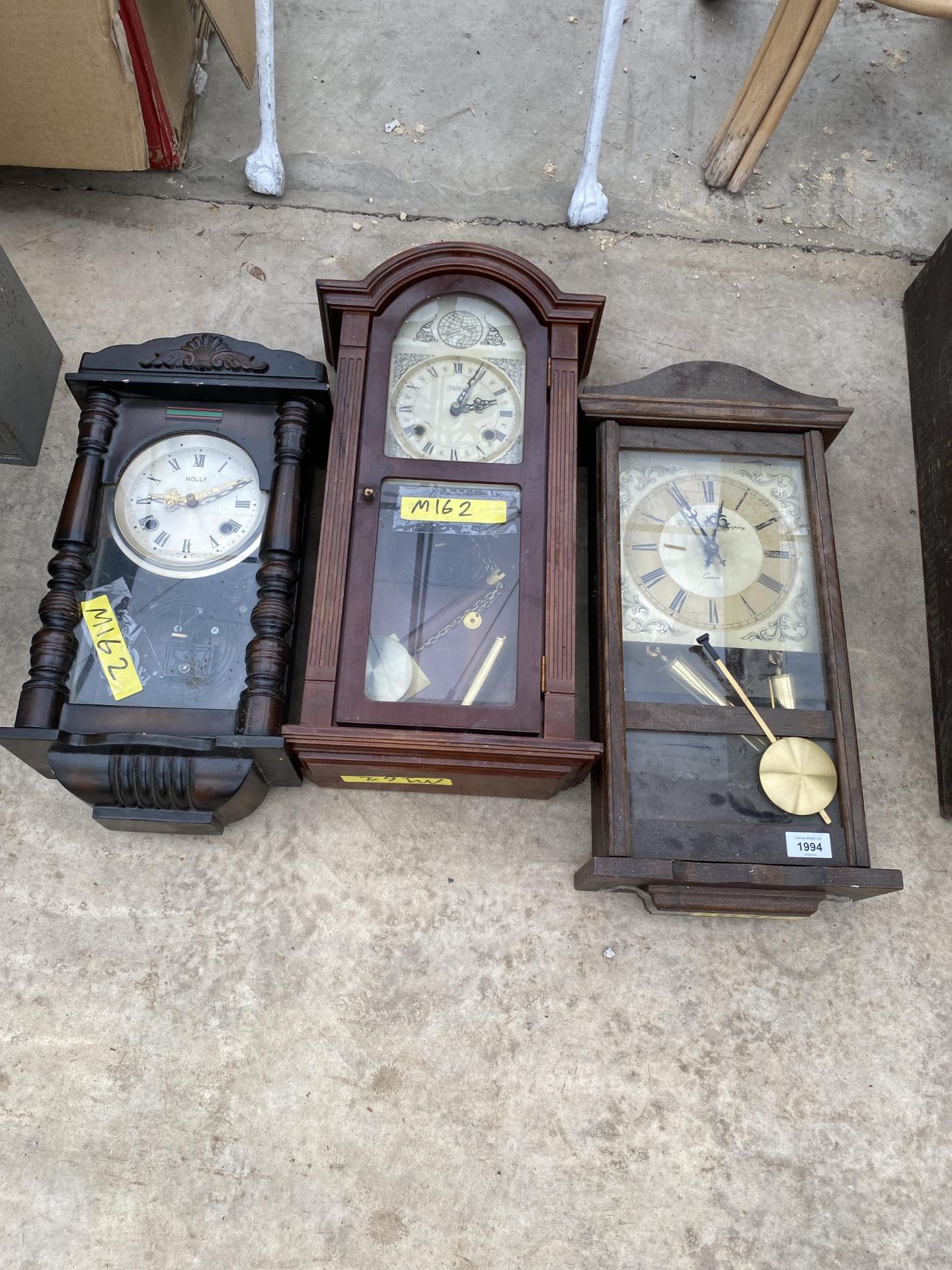 TWO CHIMING WALL CLOCKS AND A FURTHER QUARTZ WALL CLOCK